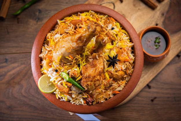 dum-handi-chicken-biryani-is-prepared-earthen-clay-pot-called-haandi-popular-indian-non-vegetarian-food_466689-52225 dum-handi-chicken-biryani-is-prepared-earthen-clay-pot-called-haandi-popular-indian-non-vegetarian-food_466689-52225
